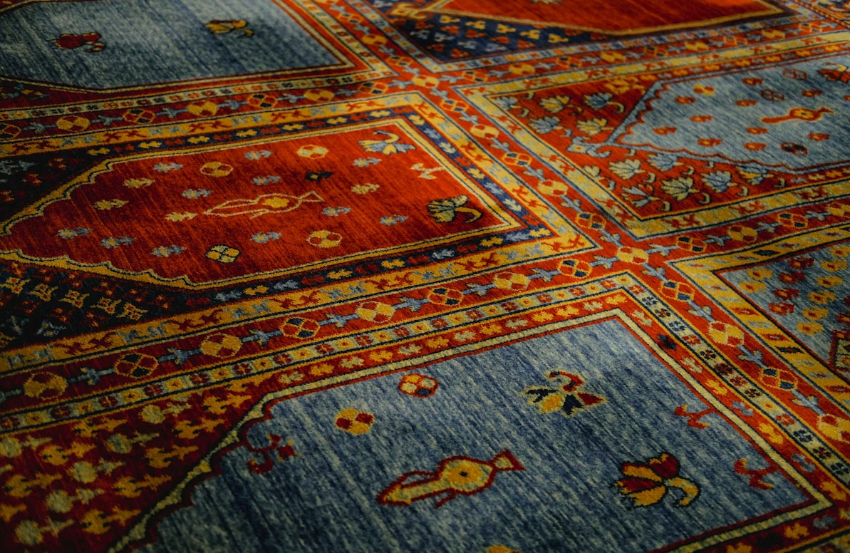 A close up of a colorful rug